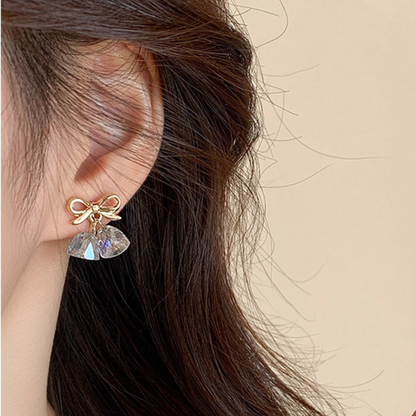 【新作｜12/14(日)〜】リボン×ベルチャームイヤリング【ノンホール（スプリングタイプ）】